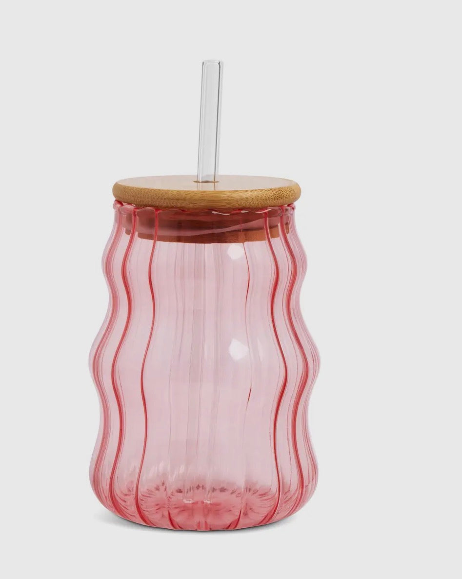 Pink glass tumbler w/ straw